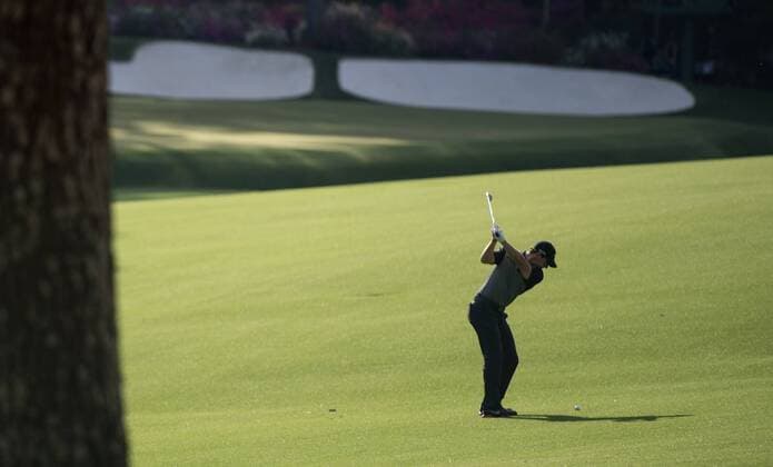 Rory McIlroy hits on the 13th fairway during the second round of the 2014 Masters Tournament at Augusta National Golf Club in Augusta, Georgia, April 11, 2014.  AUG20140411341