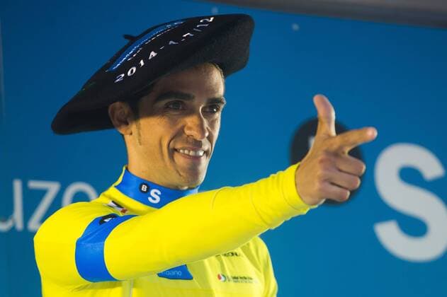 Markina, Spain. 12th of April 2014 Winner of the 2014 Tour of Basque Country, Alberto Contador of Tinkoff-Saxo Team (C) celebrates on the podium of the 54th edition of the Tour of the Basque Country on April 12, 2014 