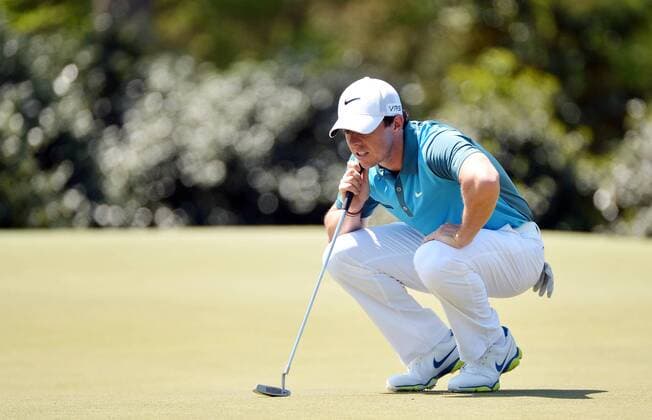 Rory McIlroy lines up a putt on the 14th hole in the third round of the 2014 Masters Tournament at Augusta National Golf Club in Augusta, Georgia on April 12, 2014.  AUG20140412302