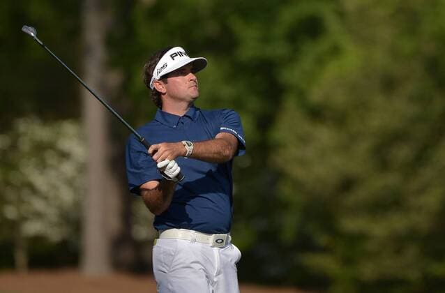 Bubba Watson watches his drive off of the 12th tee during the third round of the 2014 Masters Tournament at Augusta National Golf Club in Augusta, Georgia, April 12, 2014. Watson finished seven under par.  AUG20140412405