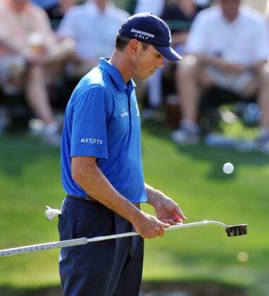 April 12, 2014 - Augusta, GA, USA - Matt Kuchar bounces his ball while waiting to putt on the 16th hole during the third round at the Masters Tournament in Augusta, Ga., Saturday, April 12, 2014. Masters Tournament - ZUMAm67