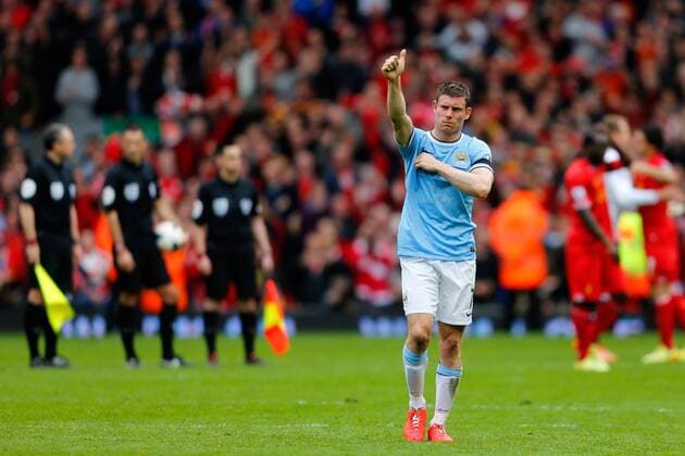 Manchester City s James Milner gestures towards the travelling fans - Barclays Premier League - Liverpool vs Manchester City - Anfield Stadium - Liverpool - 13th April 2014 - Picture Paul Thomas Sportimage EDITORIAL USE ONLY. No use with unauthorised audio, video, data, fixture lists, club league logos or live services. Online in-match use limited to 120 images, no video emulation. No use in betting, games or single club league player publications.