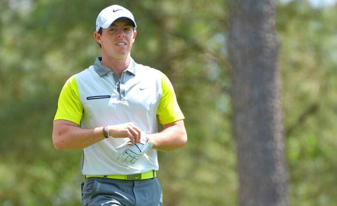 Rory McIlroy walks to the 4th fairway in the final round round of the 2014 Masters Tournament at Augusta National Golf Club in Augusta, Georgia on April 13, 2014.  AUG20140413308
