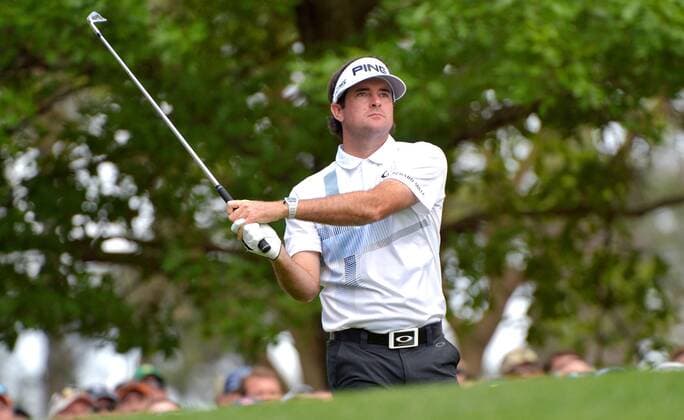 Bubba Watson hits a tee shot on the 4th hole in the final round round of the 2014 Masters Tournament at Augusta National Golf Club in Augusta, Georgia on April 13, 2014.  AUG20140413321