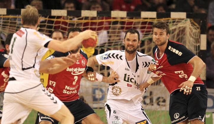 Foto: ..... Jacob Heinl, rechts, Flensburg , gegen Jens Tiedtke ( Wetzlar ) Handball Herren 1. Bundesliga 16.04.2014 SG Flensburg - HSG Wetzlar