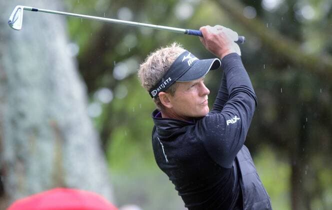 April 18, 2014 - Hilton Head Island, SC, USA - Luke Donald tees off on theh ninth hole during the second round of the RBC Heritage Presented by Boeing at Harbour Town Golf Links in Sea Pines on Hilton Head Island, S.C., Friday, April 18, 2014. RBC Heritage Presented by Boeing - ZUMAm67