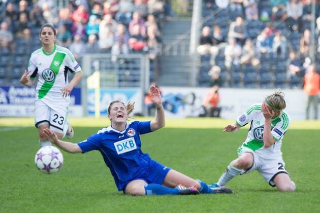 Fussball, Frauen Champions-League, 1. FFC Turbine Potsdam - VfL Wolfsburg, v.li.: Maren Mjelde (1.FFC Turbine Potsdam),Conny Pohlers (VfL Wolfsburg) xjfx