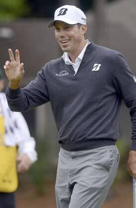 April 19, 2014 - Hilton Head Island, SC, USA - Matt Kuchar waves to the crowd after putting his ball on the sixth hole during the third round of the RBC Heritage Presented by Boeing at Harbour Town Golf Links in Sea Pines on Hilton Head Island, S.C., Saturday, April 19, 2014. RBC Heritage third round - ZUMAm67