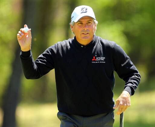April 20, 2014 - Duluth, GA, USA - Fred Couples reacts to the gallery after making his par putt on the second hole during the final round of the Greater Gwinnett Championship at TPC Sugarloaf in Duluth, Ga., Sunday, April 20, 2014. Greater Gwinnett Championship - ZUMAm67