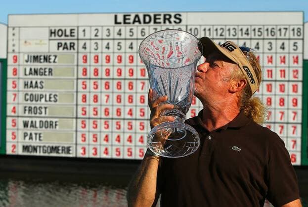 April 20, 2014 - Duluth, GA, USA - Miguel Jimenez kisses his trophy on the 18th green winning the Greater Gwinnett Championship at TPC Sugarloaf in Duluth, Ga., Sunday, April 20, 2014. Greater Gwinnett Championship - ZUMAm67