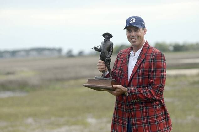 April 20, 2014 - Hilton Head Island, SC, USA - Matt Kuchar smiles with his trophy after winning the RBC Heritage Presented by Boeing on Sunday at Harbour Town Golf Links in Sea Pines on Hilton Head Island, S.C., Sunday, April 20, 2014. 2014 RBC Heritage - ZUMAm67