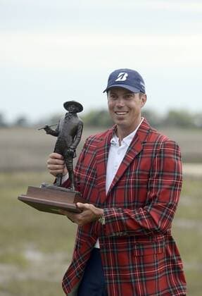 April 20, 2014 - Hilton Head Island, SC, USA - Matt Kuchar smiles with his trophy after winning the RBC Heritage Presented by Boeing on Sunday at Harbour Town Golf Links in Sea Pines on Hilton Head Island, S.C., Sunday, April 20, 2014. 2014 RBC Heritage - ZUMAm67