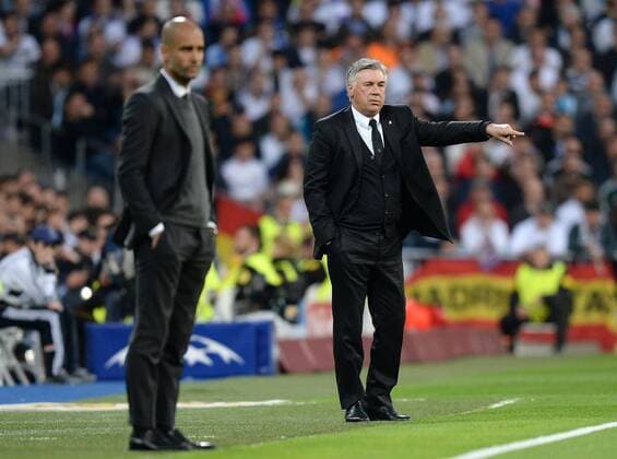 FUSSBALL CHAMPIONS LEAGUE HALBFINAL HINSPIEL SAISON 2013 2014 Real Madrid - FC Bayern München 23.04.2014 Trainer Carlo Ancelotti (re, Real Madrid) und Trainer Pep Guardiola (FC Bayern München) 