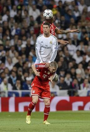 First leg of 1 2 Champions League match between Real Madrid and FC Bayern Munich. In this picture, Jerome Boateng, Cristiano Ronaldo and Bastian Schweinsteiger. xDIEGOxGxSOUTOx 