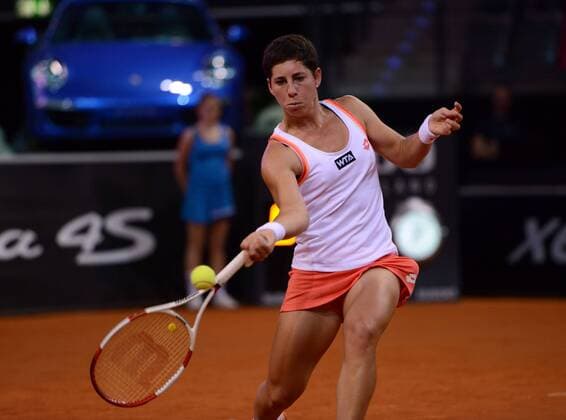 Carla Suarez Navarro (ESP) in Aktion. Porsche Tennis Grand Prix, 2014, Stuttgart, Germany.