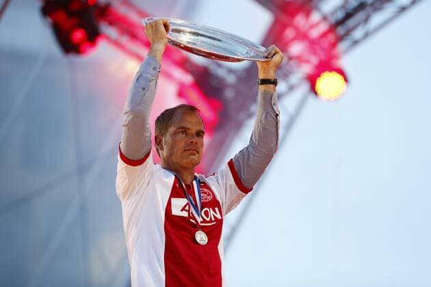 Coach Frank de Boer of Ajax celebrates with the Eredivisie Championship trophy celebrate winning the Dutch Eredivisie title at the Amsterdam Arena on April 13, 2014 in Amsterdam, The Netherlands. Ajax crowned Eredivisie champions Dutch Eredividie 2013 2014 xVIxLaurensxLindhoutxIVx 2269037