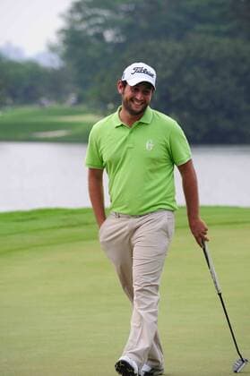 Alexander Levy of France smiles after winning the championship of the Volvo China Open in the final round match in Shenzhen city, south Chinas Guangdong province, 27 April 2014. Alexander Levy was so relaxed on the course at the China Open on Sunday (27 April 2014), not even a double bogey that erased his comfortable lead could wipe the grin from his face. Rather than get down over what could have been a costly mistake, the 23-year-old Frenchman recovered with back-to-back birdies on his final two holes to capture his maiden European Tour title by four strokes over Tommy Fleetwood. The smile, he said, was the key to victory. You need to take the pleasure on the golf course and keep the smile because if you are upset about a missed shot or not lucky because you make a lip out or something like that, it s not good to have this feeling on the golf course, he said. You need to enjoy and h  20140427_46606
