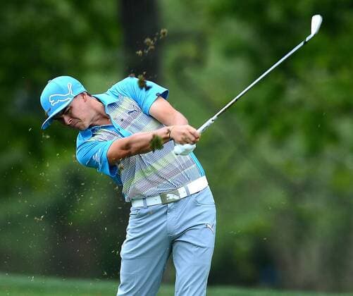 April 30, 2014 - Charlotte, NC, USA - Rickie Fowler follows through on his drive from the 16th fairway during the Wells Fargo Championship Pro-Am at Quail Hollow Club in Charlotte, N.C., Wednesday, April 30, 2014. Wells Fargo Championship Pro-Am - ZUMAm67