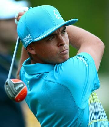 April 30, 2014 - Charlotte, NC, USA - Rickie Fowler watches the flight of his drive from the 17th tee box during the Wells Fargo Championship Pro-Am at Quail Hollow Club in Charlotte, N.C., Wednesday, April 30, 2014. Wells Fargo Championship Pro-Am - ZUMAm67