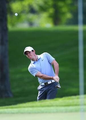 May 1, 2014 - Charlotte, NC, USA - Rory McIlroy chips on to the 15th green during the Wells Fargo Championship Pro-Am at Quail Hollow Club in Charlotte, N.C., Thursday, May 1, 2014. Wells Fargo Championship - ZUMAm67
