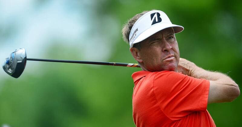 May 1, 2014 - Charlotte, NC, USA - Davis Love III squints as he tees off during the Wells Fargo Championship Pro-Am at Quail Hollow Club in Charlotte, N.C., Thursday, May 1, 2014. Wells Fargo Championship - ZUMAm67