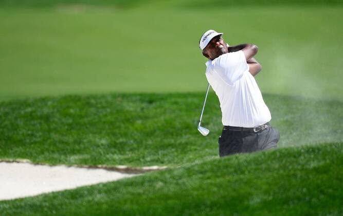 May 2, 2014 - Charlotte, NC, USA - Vijay Singh hits from a bunker on the 18th hole during the second day of the Wells Fargo Championship at Quail Hollow Club in Charlotte, N.C., Friday, May 2, 2014. Wells Fargo Championship - ZUMAm67