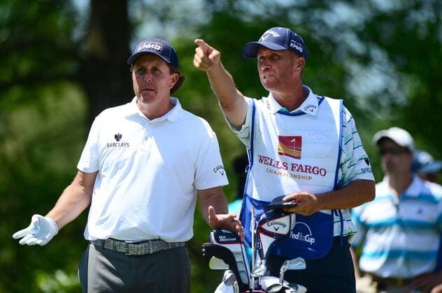 May 3, 2014 - Charlotte, NC, USA - Phil Mickelson and his caddy discuss strategy at the 16th tee during the third round of the Wells Fargo Championship at Quail Hollow Club in Charlotte, N.C., on Saturday, May 3, 2014. Wells Fargo Championship, Round 3 - ZUMAm67