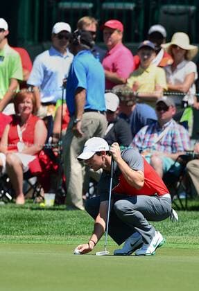 May 3, 2014 - Charlotte, NC, USA - Rory McIlroy lines up his putt on the 18th green during the third round of the Wells Fargo Championship at Quail Hollow Club in Charlotte, N.C., on Saturday, May 3, 2014. Wells Fargo Championship, Round 3 - ZUMAm67