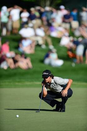 May 3, 2014 - Charlotte, NC, USA - Martin Flores lines up a putt on the 18th green during the third round of the Wells Fargo Championship at Quail Hollow Club in Charlotte, N.C., on Saturday, May 3, 2014. Wells Fargo Championship, Round 3 - ZUMAm67