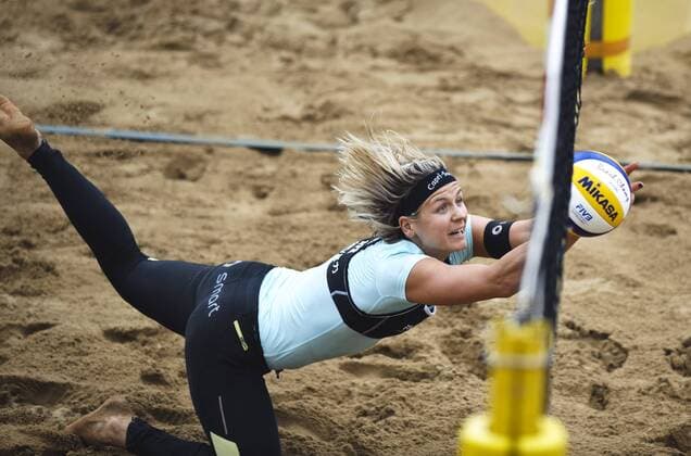 Germany s Laura Ludwig saves the ball against China during the women s final at 2014 FIVB Beach Volleyball World Tour Shanghai PPTV Grand Slam in Shanghai, east China, May 4, 2014. Germany won 2-1. (Xinhua Jiang Kehong) (SP)CHINA-SHANGHAI-BEACH VOLLEYBALL-SHANGHAI GRAND SLAM-WOMEN(CN) 