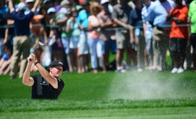 May 4, 2014 - Charlotte, NC, USA - Phil Mickelson hist from the sand on the fifth hole during the final round of the Wells Fargo Championship at Quail Hollow Club in Charlotte, N.C., on Sunday, May 4, 2014. Wells Fargo Championship - ZUMAm67