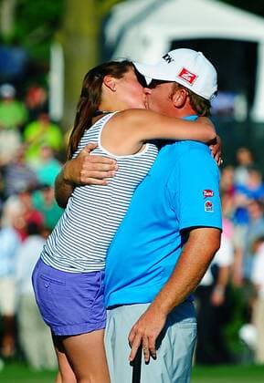 May 4, 2014 - Charlotte, NC, USA - Erica Holmes leapt into the arms of her husband, J.B. Holmes, after he won the Wells Fargo Championship at Quail Hollow Club in Charlotte, N.C., on Sunday, May 4, 2014. Wells Fargo Championship - ZUMAm67