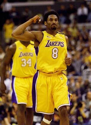 June 7, 2000 - U.S. - KRT SPORTS STORY SLUGGED: NBA Basketball Herren USA KRT PHOTOGRAPH BY MIKE FENDER INDIANAPOLIS STAR LOS ANGELES, CALIFORNIA, June 7 -- Laker Kobe Bryant celebrates things going their way after he scored in the first half against the Indiana Pacers in their championship game in Los Angeles, California. (INS) PL KD 2000 (Vert) (mvw) News Archive - June 7, 2000 - ZUMAm67