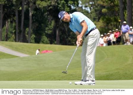 May 8, 2014 - Ponte Vedra Beach, Florida, U.S - Matt Kuchar putts the 8th green during the first round of THE PLAYERS Championship at TPC Sawgrass. Golf 2014 - Players Championship - Round 1 - ZUMAw10