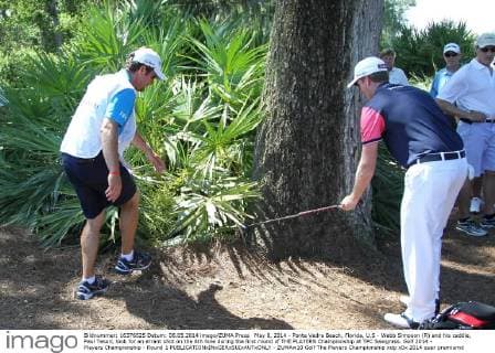 May 8, 2014 - Ponte Vedra Beach, Florida, U.S - Webb Simpson (R) and his caddie, Paul Tesori, look for an errant shot on the 8th hole during the first round of THE PLAYERS Championship at TPC Sawgrass. Golf 2014 - Players Championship - Round 1 - ZUMAw10