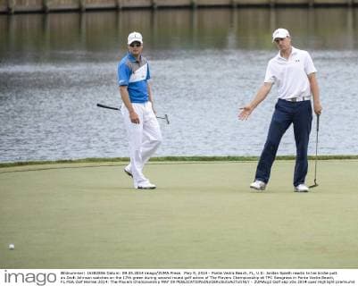 May 9, 2014 - Ponte Vedra Beach, FL, U.S: Jordan Spieth reacts to his birdie putt as Zach Johnson watches on the 17th green during second round golf action of The Players Championship at TPC Sawgrass in Ponte Vedra Beach, FL PGA Golf Herren 2014: The Players Championship MAY 09 - ZUMAcg2