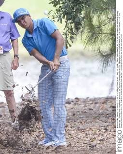 May 10, 2014 - Ponte Vedra Beach, FL, U.S: Rickie Fowler hits from the fairway hazard on 7 during third round golf action of The Players Championship at TPC Sawgrass in Ponte Vedra Beach, FL PGA Golf Herren 2014: The Players Championship MAY 10 - ZUMAcg2