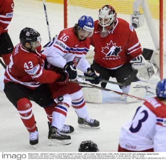 Left to right: Nazem Kadri (CAN), Martin Zatovic (CZE) and goalkeeper James Reimer (CAN) during the Group A match Czech Republic vs. Canada at the Ice Hockey World Championship, in Minsk, Belarus, May 12, 2014. (CTKxPhotoxMichalxKamaryt) CTKPhotoOF201405121040401  kmt 2
