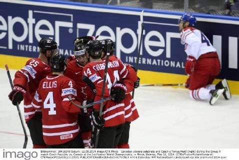 Canadian players celebrate and Czech s Tomas Hertl (right) during the Group A match Czech Republic vs. Canada at the Ice Hockey World Championship, in Minsk, Belarus, May 12, 2014. (CTKxPhotoxMichalxKamaryt) CTKPhotoOF201405121127001  kmt 6