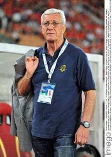 Head coach Marcello Lippi of Chinas Guangzhou Evergrande watches his players competing against Japans Cerezo Osaka in their second leg of the Round of 16 during the 2014 AFC Champions League in Guangzhou city, south Chinas Guangdong province, 13 May 2014. Guangzhou Evergrande was defeated by Cerezo Osaka by the score of 0 to 1 in their second leg of the Round of 16 during the 2014 AFC Champions League in Guangzhou city, south Chinas Guangdong province, on Tuesday (13 May 2014). Guangzhou Evergrande defeated by Cerezo Osaka 0-1 at AFC Champions League  20140513_14453