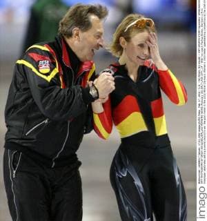 Feb. 17, 2002 - U.S. - NO MAGS, NO SALES -- KRT SPORTS STORY SLUGGED: SPEEDSKATE KRT PHOTOGRAPH BY ERICH SCHLEGEL DALLAS MORNING NEWS (February 20) SALT LAKE CITY, UT - With her coach Markus Eicher, Germany s Anni Friesinger celebrates setting a world record to win the gold medal in the 2002 Winter Olympics Women s 1500 meter speedskating competition at the Utah Olympic Oval Wednesday afternoon, February 20, 2002 in Salt Lake City, Utah. (DA) NC KD BL 2002 (Vert) (Digital image) (smd) News Archive - Feb. 17, 2002 - ZUMAm67