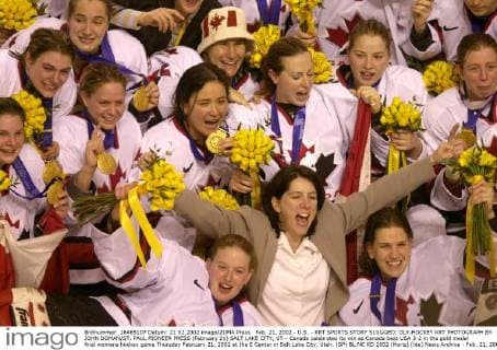 Feb. 21, 2002 - U.S. - KRT SPORTS STORY SLUGGED: OLY-HOCKEY KRT PHOTOGRAPH BY JOHN DOMAN ST. PAUL PIONEER PRESS (February 21) SALT LAKE CITY, UT-- Canada celebrates its win as Canada beat USA 3-2 in the gold medal final womens hockey game Thursday February 21, 2002 at the E Center in Salt Lake City, Utah. (SP) BL NC KD 2002 (Horiz) (lde) News Archive - Feb. 21, 2002 - ZUMAm67