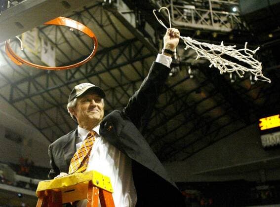 Mar. 14, 2004 - U.S. - DALLAS, TX -- Eddie Sutton, head coach of the Oklahoma State, holds up the net as she celebrates Oklahoma s victory over the University of Texas in the Big 12 Tournament Championship. Oklahoma defeated Texas, 66-47, at Reunion Arena in Dallas, Texas. - March 14, 2004 - ZUMAm67