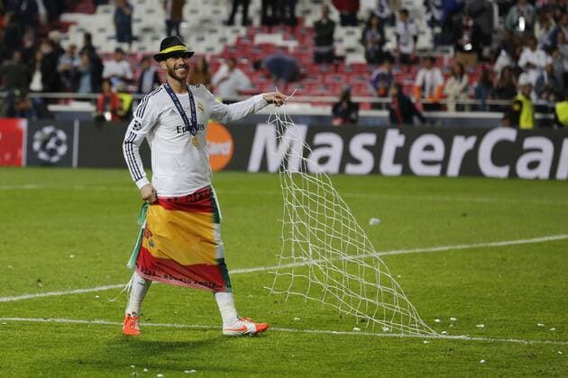 Sergio Ramos (Real Madrid CF 4) smiling with a hat and a part of the goal net in his hands after the final of the Champions league between Real Madrid and Atletico Madrid, Estadio da Luz in Lisbon on May 24., 2014. Real Madrid gegen Atletico Madrid im Finale der Champions League, Saison 2013 2014 am 24. Mai 2014.