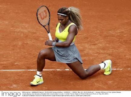 (140525) -- PARIS, May 25, 2014 (Xinhua) -- Serena Williams of the United States reacts during her Women s Singles first round match on day 1 of the French Open at Roland Garros in Paris on May 25, 2014. 