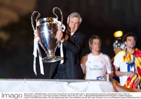 Real Madrid Carlo Ancelotti celebrating the victory after the Champions League final in the Plaza de Cibeles in Madrid. Madrid May 24, 2014. 