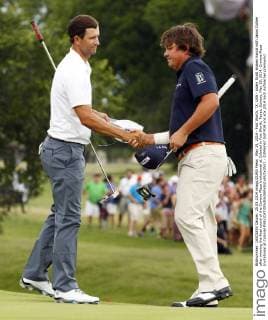 May 25, 2014 - Fort Worth, TX, USA - Adam Scott shakes hands with Jason Dufner after winning the final round of the Crowne Plaza Invitational at Colonial in Fort Worth, Texas, Sunday, May 25, 2014. Crowne Plaza Invitational at Colonial - ZUMAm67