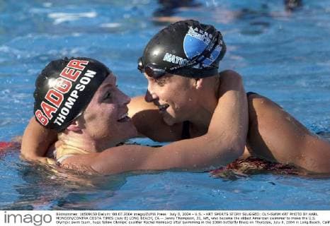 July 8, 2004 - U.S. - KRT SPORTS STORY SLUGGED: OLY-SWIM KRT PHOTO BY KARL MONDON CONTRA COSTA TIMES (July 8) LONG BEACH, CA -- Jenny Thompson, 31, left, who became the oldest American swimmer to make the U.S. Olympic swim team, hugs fellow Olympic qualifier Rachel Komisarz after swimming in the 100m butterfly finals on Thursday, July 8, 2004 in Long Beach, California. (mvw) 2004 News Archive - July 8, 2004 - ZUMAm67
