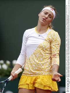 (140526) -- PARIS, May 26, 2014 (Xinhua) -- Ksenia Pervak of Russia reacts during the Women s Singles first round match on day 2 of the French Open at Roland Garros in Paris on May 26, 2014. (Xinhua Wang Lili) FRANCE-PARIS-TENNIS-FRENCH OPEN-DAY 2 