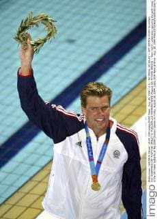 Aug. 20, 2004 - U.S. - NO MAGS, NO SALES -- KRT SPORTS STORY SLUGGED: OLY-SWIMMING KRT PHOTO BY SMILEY N. POOL DALLAS MORNING NEWS (August 20) ATHENS GREECE -- Gary Hall Jr. celebrates capturing the gold medal in the 50-meter butterfly at the 2004 Olympic Games on Friday, August 20, 2004. (gsb) 2004 News Archive - Aug. 20, 2004 - ZUMAm67